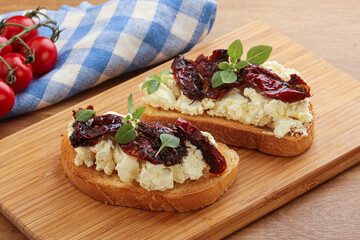 Bruschetta with soft cheese and tomato