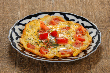Health breakfast - Omelet with tomato