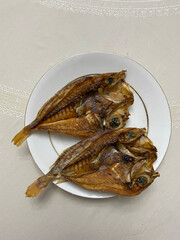 Photo of Katambak or Dried Sweetlip Emperor Fish on Plate Filipino Dish