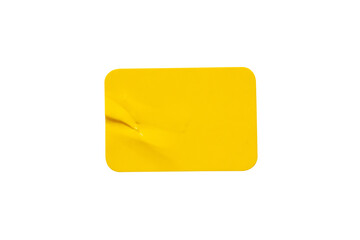 Yellow plastic sticker label isolated on white background