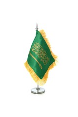 Saudi Arabian flag hanging on the metallic pole.