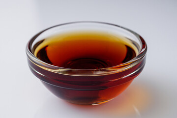fragrant fish sauce on a white acrylic background