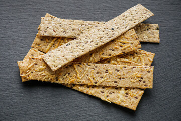 diet crispy bread on a black stone background