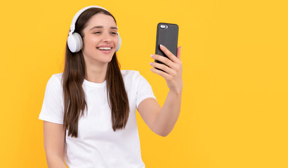 influencer blogging. happy laughing girl in headphones. webinar in wireless headset.