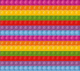 Colorful pop it pattern silicone anti-stress toy rainbow with texture, pattern. Rainbow toy with bright bursting bubbles.