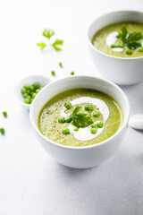 Homemade green pea soup with cream