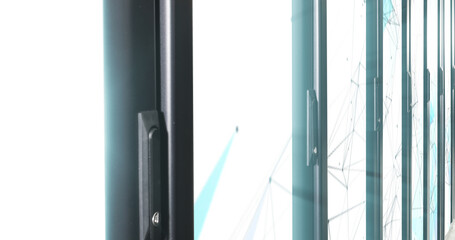 Image of moving shapes over server room