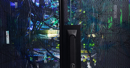 Image of moving shapes over server room