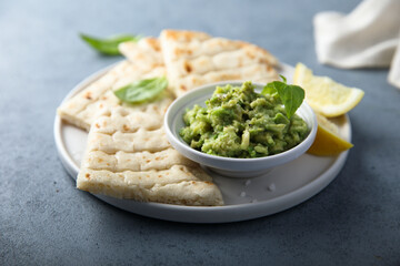 Healthy mashed avocado with pita bread
