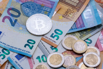 euro banknotes and coins