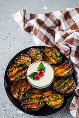 grilled eggplant on Georgian on a gray stone background