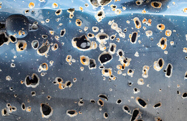 Car riddled with bullets. War of Russia against Ukraine. A car of civilians shot by the Russian...