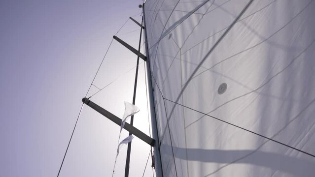 White sail yacht view from below. 