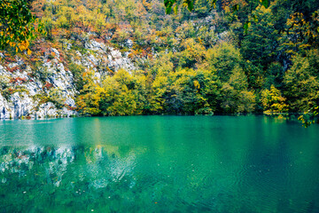 Autum colors and waterfalls of Plitvice National Park - 509355806