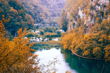 Autum colors and waterfalls of Plitvice National Park - 509356278