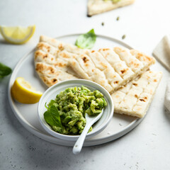 Healthy mashed avocado with pita bread