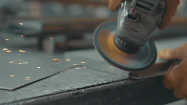 Grinding Work with Smooths Equipment for Steel Metal, Iron, Sparks at Manufacturing Heavy Industry Factory Closeup Indoor. Metalwork Assembly, Heat Detail Welding by Professional Laborer Using Grinder