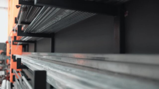 metal profiles on the shelf, metal industry background