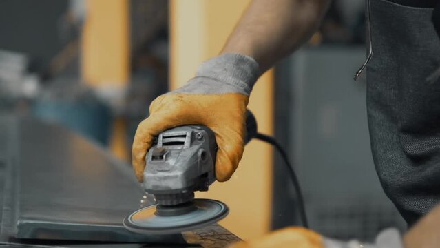 Grinding Work with Smooths Equipment for Steel Metal, Iron, Sparks at Manufacturing Heavy Industry Factory Closeup Indoor. Metalwork Assembly, Heat Detail Welding by Professional Laborer Using Grinder