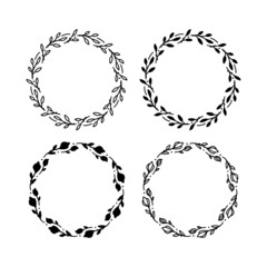 Obraz premium Set of 4 hand drawn spring wreaths isolated on white background, vector. Outline and silhouette frames with leaves. Doodle style.Collection of floral monogram frames.