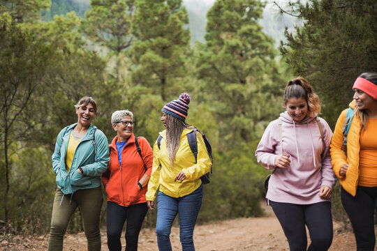 Multi generational women having fun during trekking day outdoor