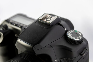 Professional dslr camera equipment with 70-300 mm tele zoom objective with wide camera lens in macro close-up view shows details of photographic equipment for studio shots and portrait wildlife photos