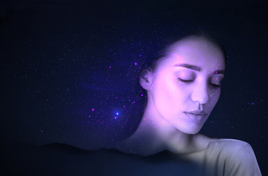 Double exposure of beautiful woman and landscape under starry sky. Astrology concept