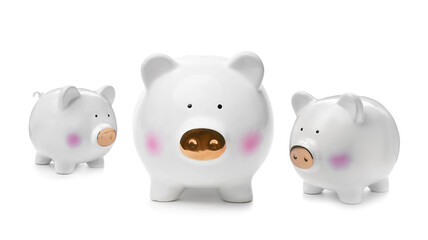 Cute ceramic piggy banks on white background