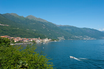 Fototapeta na wymiar Landscape with Lake Maggiore and a view of Cannobio in Piedmont in Italy