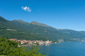 Fototapeta na wymiar Landscape with Lake Maggiore and a view of Cannobio in Piedmont in Italy