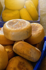 focus on individual chees blocks ready cured
