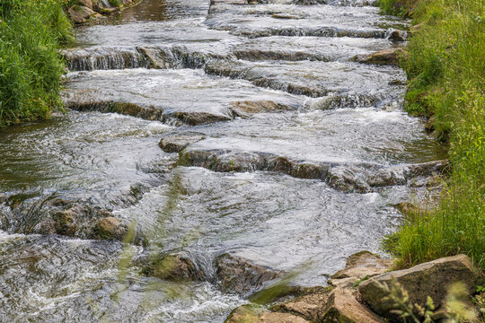 The Singold near Langerringen in Bavaria is an important industrial tributary of the water city of Augsburg
