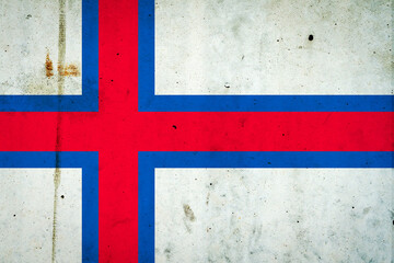 Faroe Islands flag on a concrete wall. Signs and symbols.