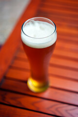 Full beer glass on a table