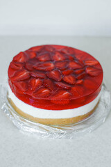 Summer dessert strawberry cheesecake with gelatin layer