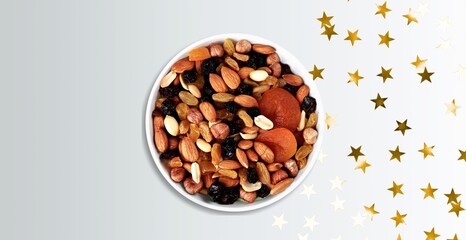 Collections Muslim food, holiday concept. Stack of nuts and dried fruits.