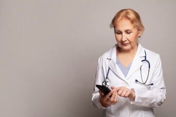 Medicine doctor using smart phone - Powered by Adobe