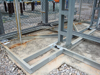 Foundation steel structure on concrete flooring supporting electrical equipment in high voltage...