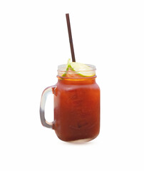 Cold ice tea with lemon (limeade) color orange in large glass with brown straw. It looks like lemonade squeezed from lemons. isolated on white background. Popular fruit juice.