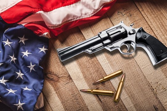 Bullets with an USA flag on a wood background