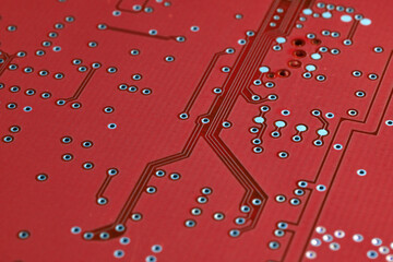 close-up of red printed electronic board. selective focusing