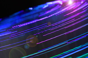 abstract background. colorful light trails created with fiber optic light source. wallpaper
