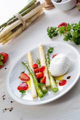 Burrata cheese with asparagus and strawberries