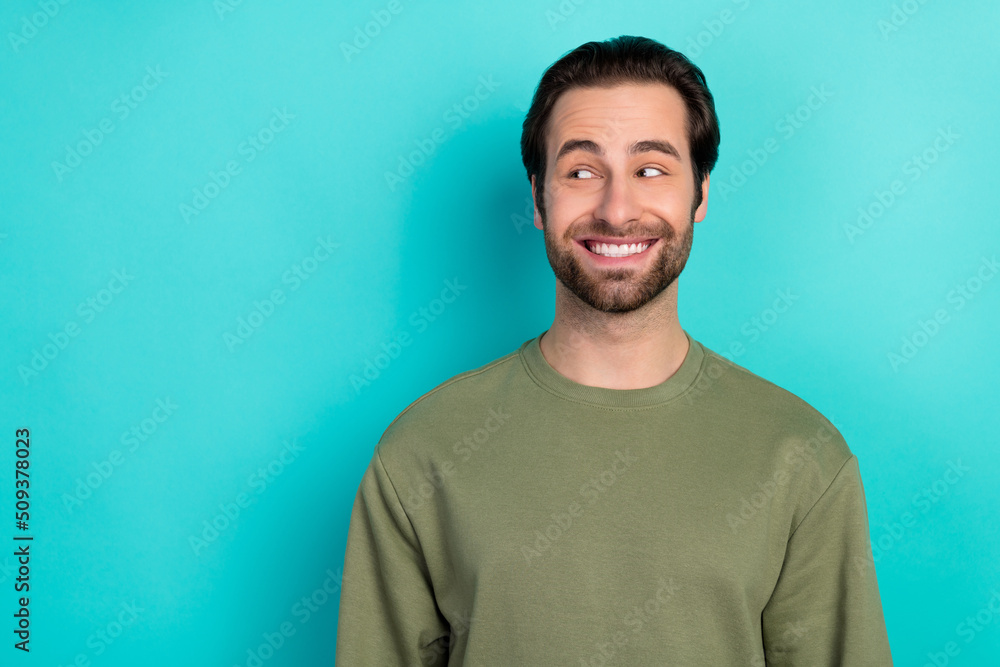 Sticker Photo of impresssed brunet young guy look promo wear green shirt isolated on teal color background