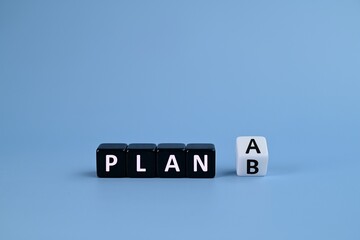 Turned cube and changing the text 'Plan A' to 'Plan B'. Business concept.