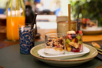 Mediterranean breakfast outdoors in the courtyard of a house with fruit salad