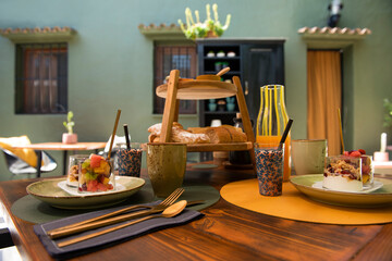 Mediterranean breakfast outdoors in the courtyard of a house with fruit salad