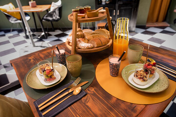 Mediterranean breakfast outdoors in the courtyard of a house with fruit salad