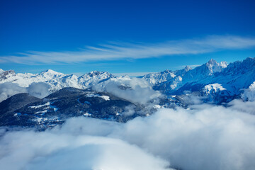 Panorama above clouds of Alps mountains and Mont Blanc massif
