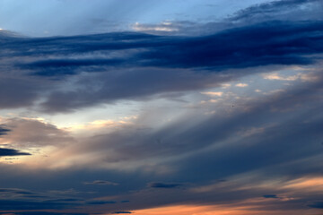 Fototapeta na wymiar Sunset horizon in the evening bright yellow red clouds